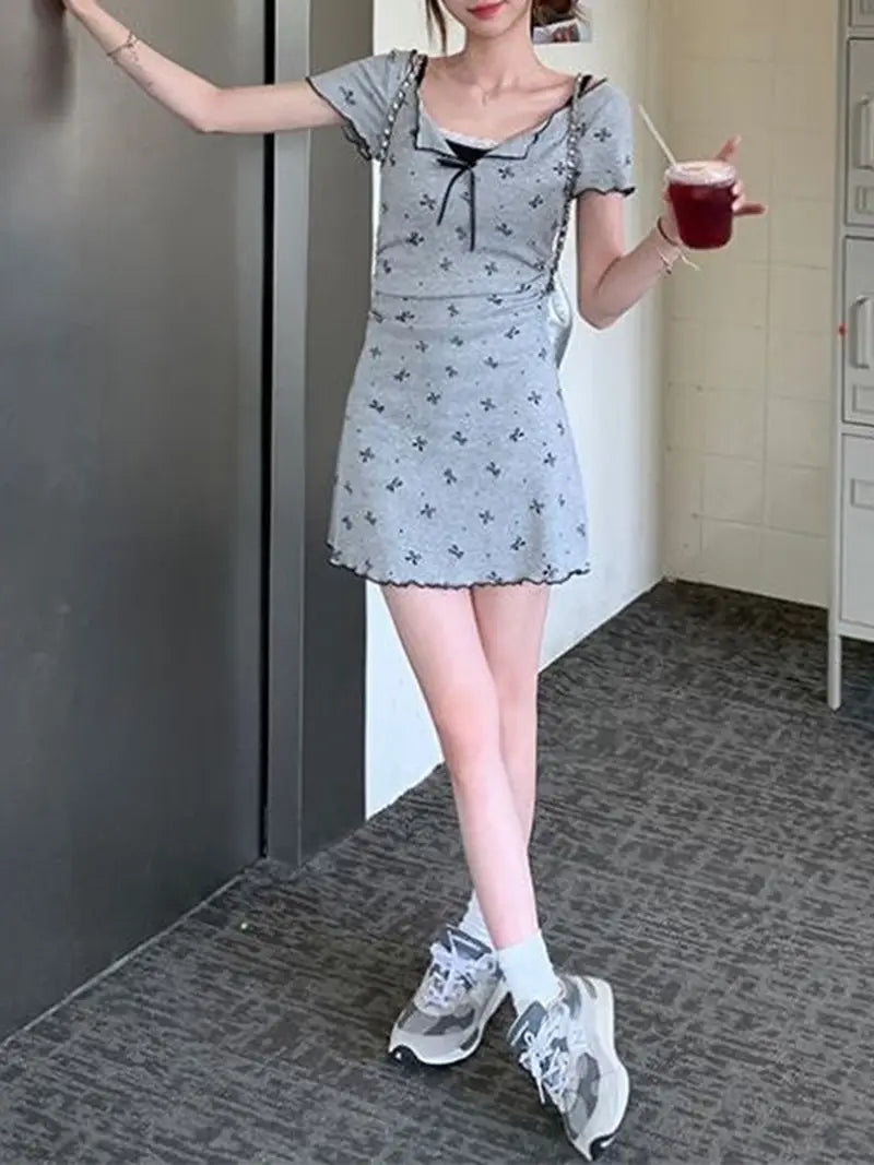 Fit, Casual Chic | Light Blue Floral Print Mini Dress with Decorative Bow & High Neckline | Women'S Fashion | No Belt, Short Sleeve | Adult Size | Perfect for Casual Attire, Summer Casual Wear | Chic Mini Dress | Stylish Ruffle Detail