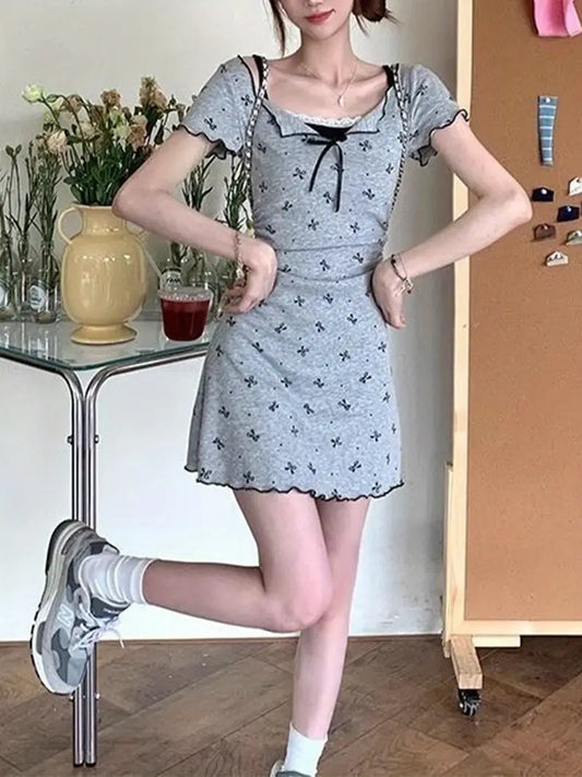 Fit, Casual Chic | Light Blue Floral Print Mini Dress with Decorative Bow & High Neckline | Women'S Fashion | No Belt, Short Sleeve | Adult Size | Perfect for Casual Attire, Summer Casual Wear | Chic Mini Dress | Stylish Ruffle Detail
